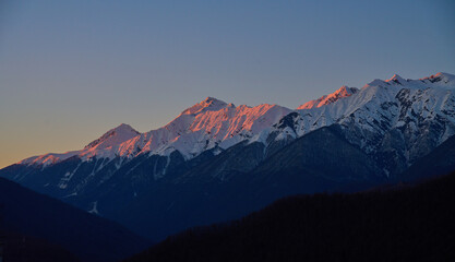 Crimson Sunset on Mountain Peaks - 773101309