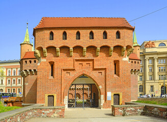 Barbican of Krakow, Poland - A defensive gate from the 90s of the 15th century that was once part of the fortifications. Krakow is UNESCO World Heritage Site - obrazy, fototapety, plakaty
