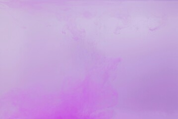 Purple color dye melt on white background,Abstract smoke pattern,Colored liquid dye,Splash paint