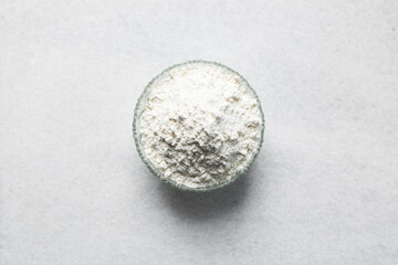 All purpose flour in a glass bowl, baking flour in a bowl