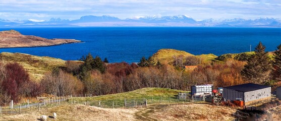 Panoramic aerial view of village houses on the shore of Isle of Skye, Scotland, UK