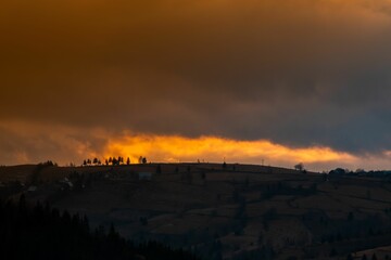 Aerial view of a Dark and moody autumn isolated landscapes in Apuseni Mountains, Romania