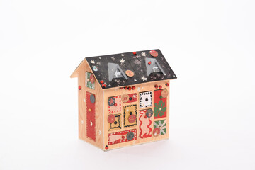 advent calendar in the shape of a homemade mountain chalet