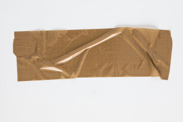 Wrinkled Brown Duct Tape Strip Isolated on Clear Background.