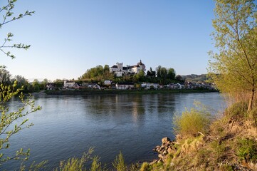 Fototapeta premium Breathtaking view of Ottensheim, taken from Wilhering during the golden hour.