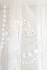 Luxury chandelier in the room, closeup of photo
