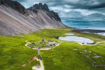 Abandoned icelandic viking village on wilderness near Vestrahorn mountain during summer at Stokksnes peninsula, Iceland - 773153752