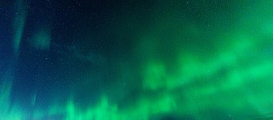 Aurora Borealis, Northern lights glowing and dancing with starry in the night sky