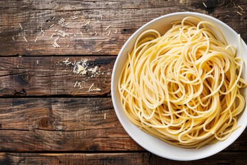 A white bowl filled with pasta sits on a wooden table in a classic Italian cuisine setting