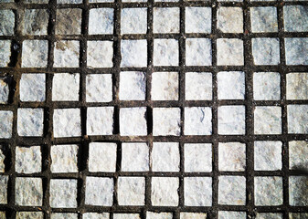 Grid shaped street tile block texture backdrop