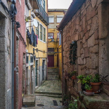A narrow, rustic allyway, in the Ribeira district of Porto, Portugal