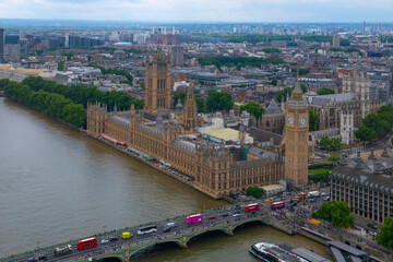 Big Ben, the Palace of Westminster and Westminster Bridge over River Thames aerial view in London,...