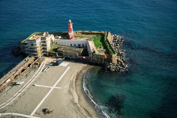 Baia, Naples,, Italy. Lighthouse beach from the terrace of the Aragonese castle - obrazy, fototapety, plakaty