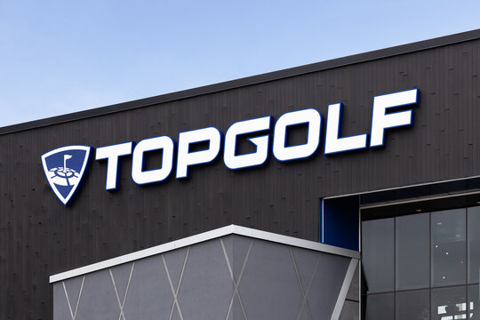 Schaumburg, IL, USA - March 27, 2024: TopGolf features multiple floors of driving range bays and is a fun entertainment complex for all ages to enjoy.
