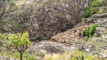 Beautiful waterfall sliding down the rock wall in Serra do Espinhaço in Minas Gerais, Brazil