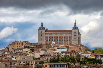 Imposing view of the Alcazar of Toledo, Castilla la Mancha, Spain, a world heritage site, high above the city on a cloudy day