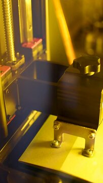 Detail of a 3d resin printer in operation, vertical
