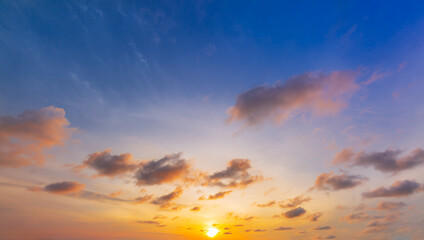 Clouds and sky in the evening,Real amazing panoramic sunrise or sunset sky with gentle colorful clouds. Long panorama, crop it