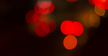Bokeh background orange lights,Circles of yellow lights out of focus,Amber...