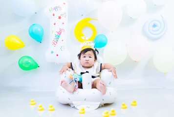 A girl is celebrating her 1st birthday,Indian baby girl celebrate her first birthday.