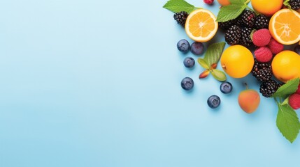 Top view of various summer vitamin fruits and berries: peach, mint, blueberry, orange, blackberry,...
