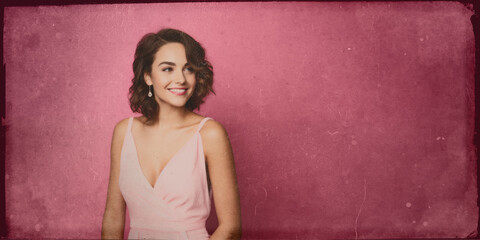 Fototapeta premium smiling woman in old-fashioned retro style, isolated on vintage background