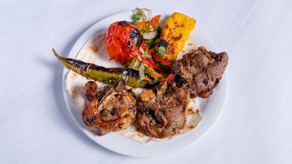 Mutton kebab on plate top view
