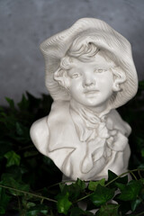 Germany Stature Sculpted head, head carved from white stone, Girl with a antique hat.with green leaves