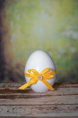 Eggs wrapped in a colorful gift tie. Easter, Pascha or Resurrection Sunday concept