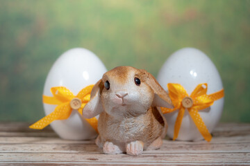 Eggs wrapped in a colorful gift tie with a rabbit. Easter, Pascha or Resurrection Sunday concept