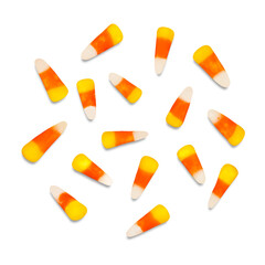 Multiple Pieces of Candy Corn Scattered Against Transparent Background