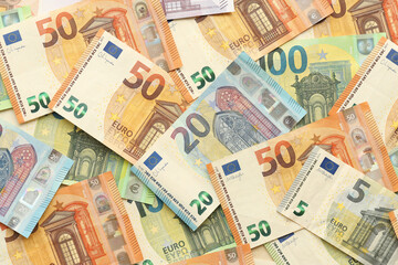 Many european euro money bills. Lot of banknotes of european union currency close up