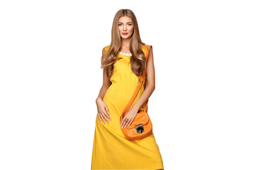 Portrait of Fashion Young woman in Yellow Dress. Female Model in Stylish Spring Summer Outfit. Girl Posing on a transparent Background. Blonde Lady with Orange Handbag