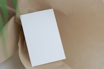 blank note paper on wooden background Blank paper for mockup business card decoration on a wooden...