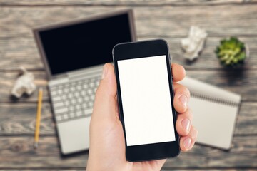 Hand hold modern smartphone with blank screen,