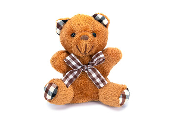 Teddy bear doll isolated on white background. Brown Knitting wool bear toy with ribbon bow isolated
