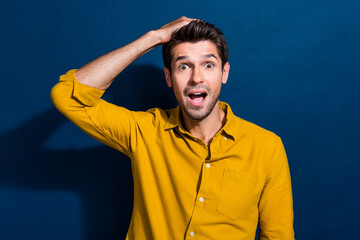 Photo portrait of nice young male touch head shocked frightened dressed stylish yellow garment...