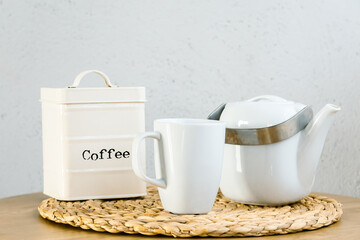 Close up shot of a vintage coffee set: carafe, mug and container with the word Coffee. Copy space.