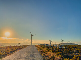 Lansdcape with wind turbines. Renewable energy on the middle of Serra da Arada Arouca Geopark, in center of Portugal - obrazy, fototapety, plakaty