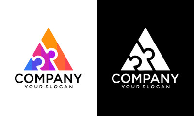 Puzzle icon vector. Triangle from colored jigsaw puzzle pieces. Four puzzle pieces connected to each other. Vector illustration isolated on white background