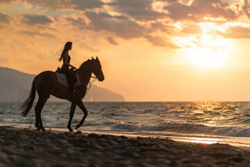 A woman riding a horse along the seaside