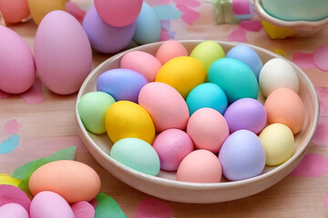 Pastel Easter Palette. A visually pleasing composition featuring a gradient of pastel-colored Easter decorations such as eggs