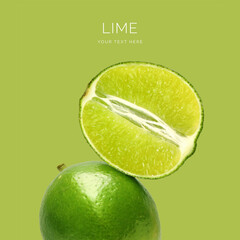 Creative layout made of green lime on the green background. Food concept. Macro concept.