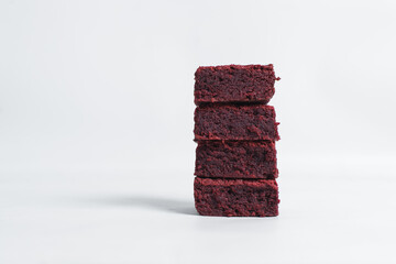red velvet brownies on a white marble tray, red velvet fudge brownies on a white background