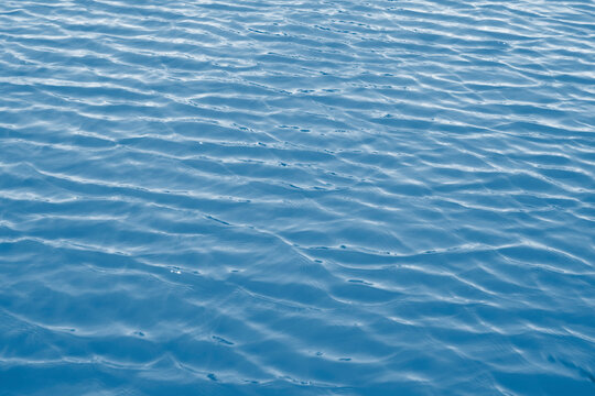 Blue expanse of water at sea as abstract background.