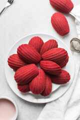 Top view of Red velvet madeleines on a white plate, red madeleines cake or cookies for valentines
