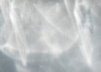 blue concrete wall with glare and glow of light
