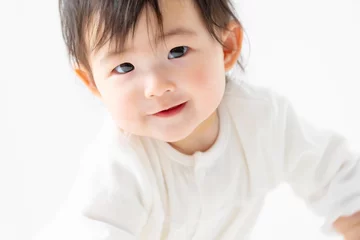 Fotobehang 赤ちゃん © naka