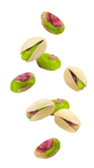 Poster Falling pistachio isolated on white background, full depth of field © grey