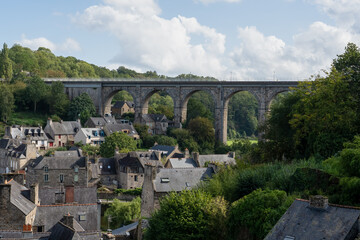 Fototapeta premium a 19th century viaduct over river Rance, and medieval town of Dinan, France